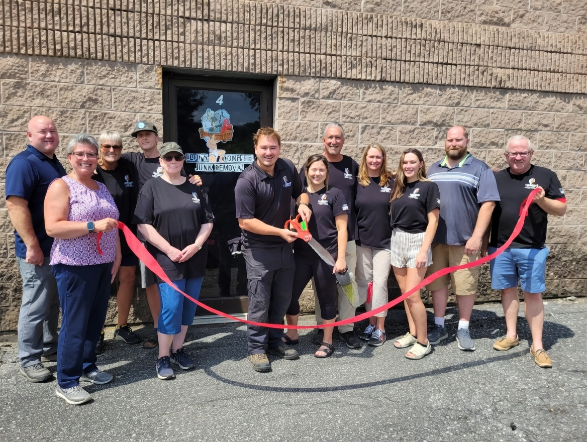 Cody's Complete Junk Removal team at ribbon cutting